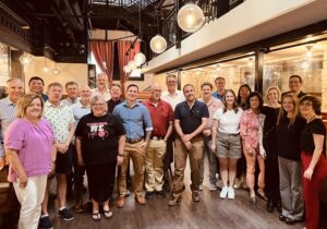 Group of attendees at the Leeds School of Business meeting